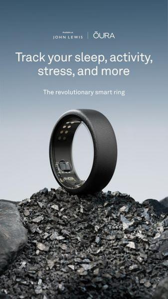 This creative showcases a smart ring centered on a rugged, dark rock surface against a soft, gradient background to emphasize its sleek design and durability.